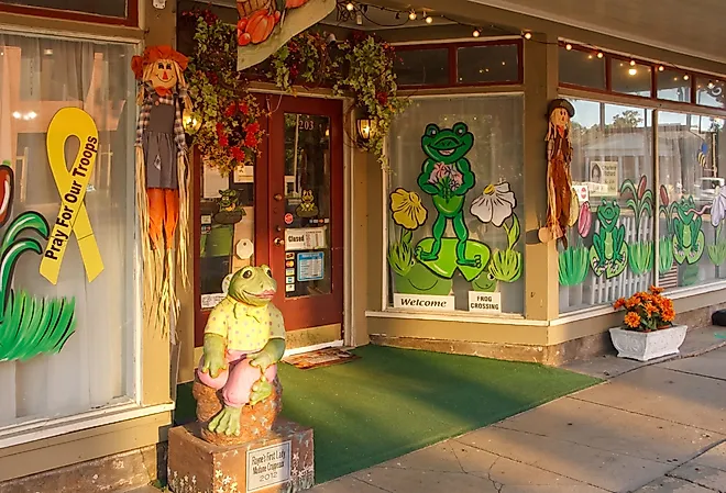  Downtown storefront in Rayne, Louisiana, with a frog theme and fall decorations. Image credit danf0505 via Shutterstock.