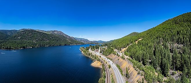 Aerial View of Highway by the lake and mountains. Moyie, East Kootenay, BC, Canada