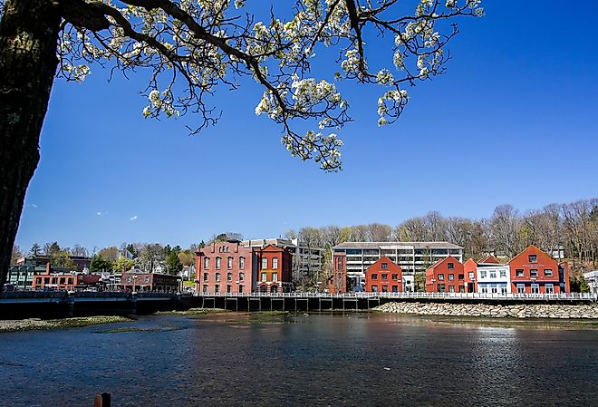 View from the Westport Bridge over Saugatuck River and architecture near downtown. Image credit Miro Vrlik Photography via Shutterstock.