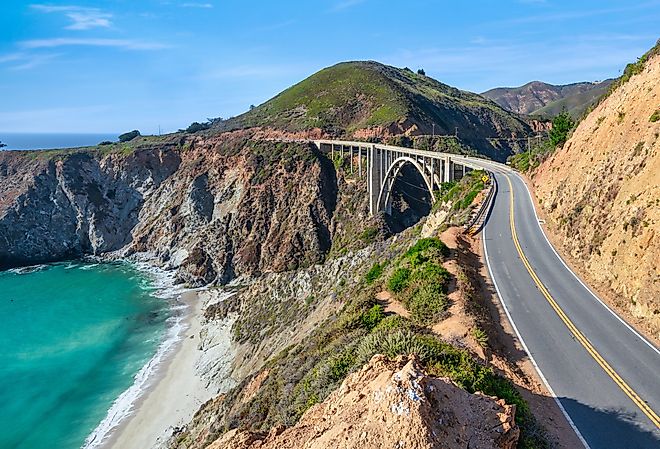 Beautiful scenery of Pacific Ocean coast along Highway 1 and Big Sur, wonderful aerial view of Bixby Bridge.