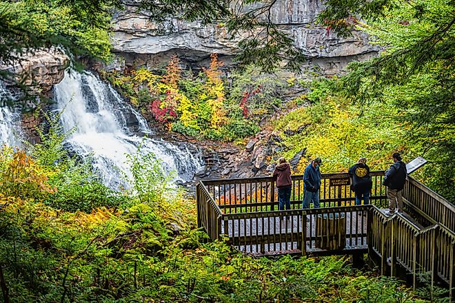 Visitors enjoying the sight of the Blackwater Falls at the Blackwater Falls State Park. Editorial credit: Kristi Blokhin / Shutterstock.com