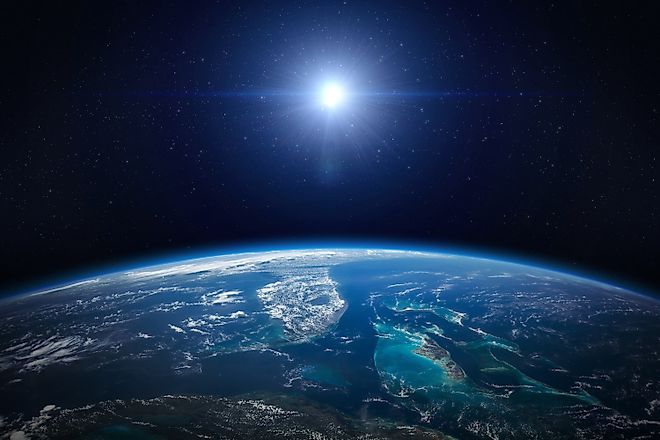 View of the Earth, galaxy and star. Image Credits: buradaki via Shutterstock