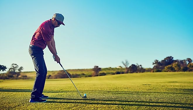 Golfer getting ready for his shot.