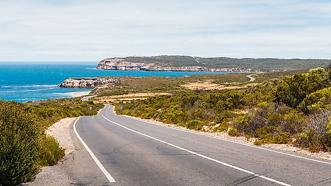 Winding road along the coast of Innes National Park on a bright day, Yorke Peninsula, South Australia.