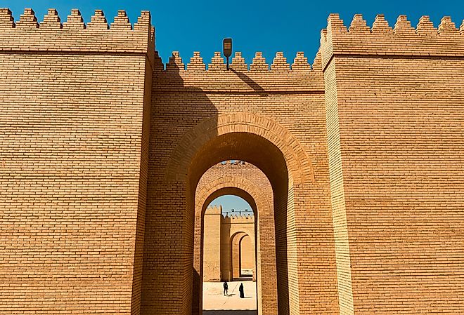 Exploring the ancient ruins of Babylon in Iraq with impressive brick architecture.