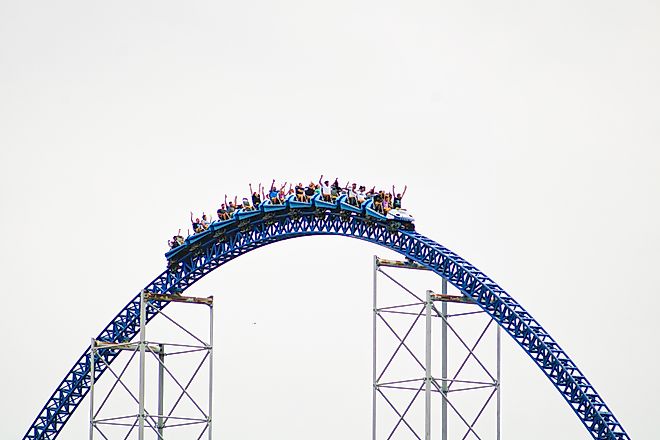 The train of Millennium Force crests a hill at Cedar Point in Sandusky, Ohio. Via Shutterstock / CJDPhotos