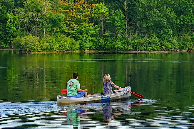 A couple canoeing in Metamora, Michigan, just an hour from Detroit. Editorial Credit: Fsendek, Shutterstock.com