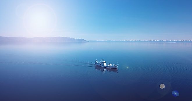Aerial view of a ship floating in the water. Lake Baikal. Blue water.