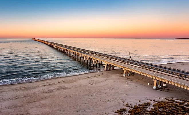Aerial panorama of the Chesapeake Bay Bridge Tunnel at sunset.