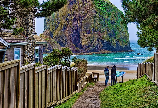 Public beach access path at Cannon Beach, Oregon, with the stunning coastline and Haystack Rock.