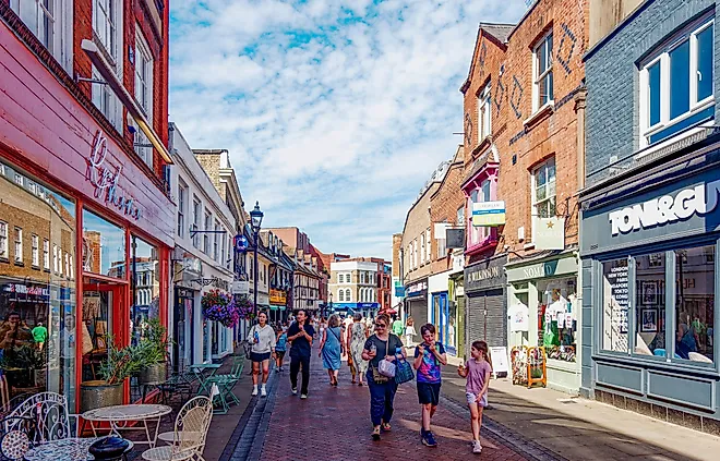 Tourists stroll through the pedestrian shopping streets of Windsor, England. Image credit: Darryl Brooks / Shutterstock.com.