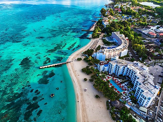 Aerial view of Montego Bay waterfront with hotel and beaches.