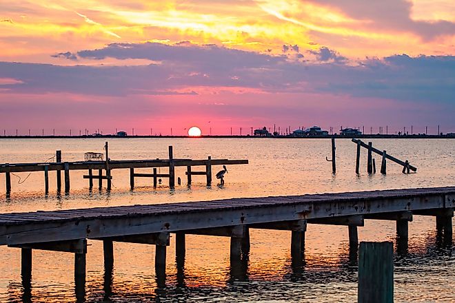 Sunset over Caminada Pass at Grand Isle, Louisiana.