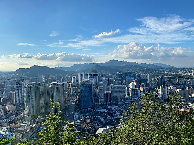 Seoul’s mountain backdropped skyline as seen from halfway up Namsan Mountain on a sunny day. Credit: Andrew Douglas
