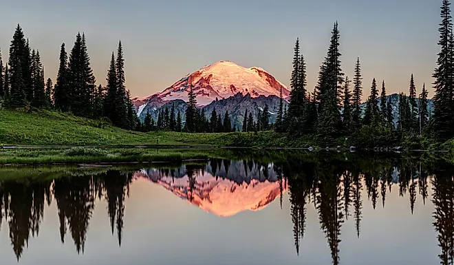 The reflection of Mount Rainier on the calm waters of the Tipsoo Lake in the Mount Rainier National Park, Washington.