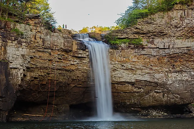 Hikers rappelling down DeSoto Falls in Northeast Alabama.