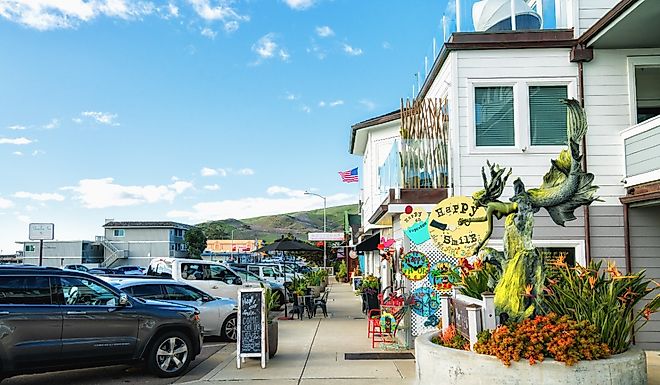 Antique stores, restaurants, historic buildings, steps from the beach, in Cayucos, California. Image credit HannaTor via Shutterstock