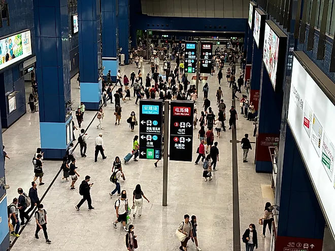 a bustling MTR (Mass Transit Railway) station in the Tai Wai area of Hong Kong. 