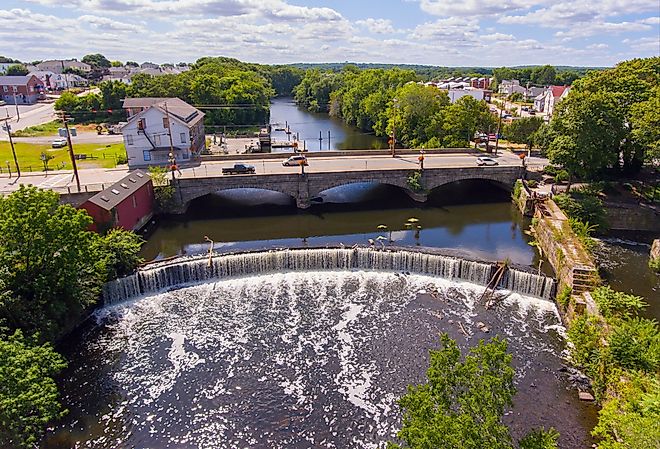 Valley Falls and Board Street bridge over Blackstone River at Valley Falls Heritage Park, Central Falls, Rhode Island.