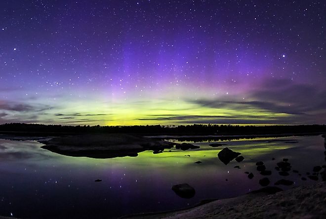 The northern lights shining over the waters of Voyageurs National Park from the Ash River Visitor Center, Minnesota. 