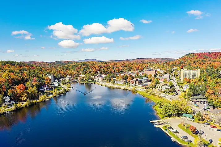 Colorful aerial view of Saranac Lake New York in the Adirondack Mountains.