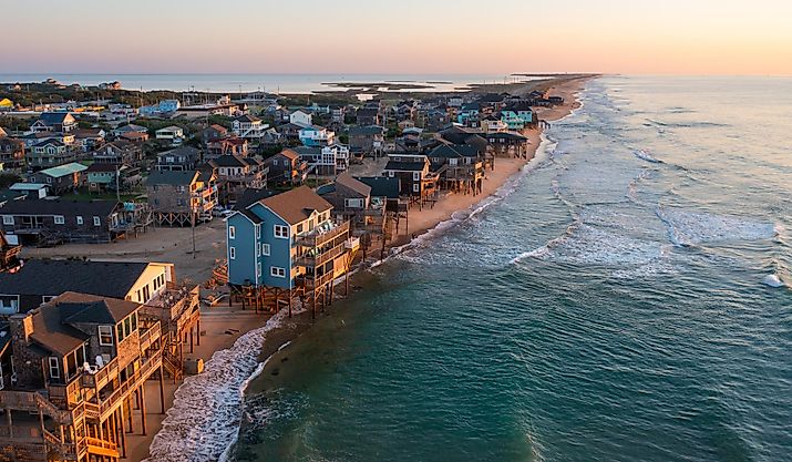 Aerial view of homes right on the shoreline in Buxton, North Carolina.