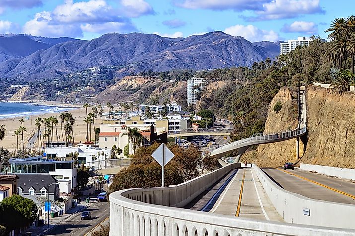 Beautiful scenery of the Santa Monica gulf and mountains over renewed Pacific Highway descent. California.
