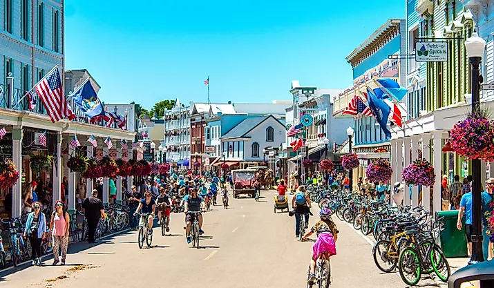 A busy day in downtown Mackinac Island, Michigan. Image credit: Michael Deemer via Shutterstock.com.