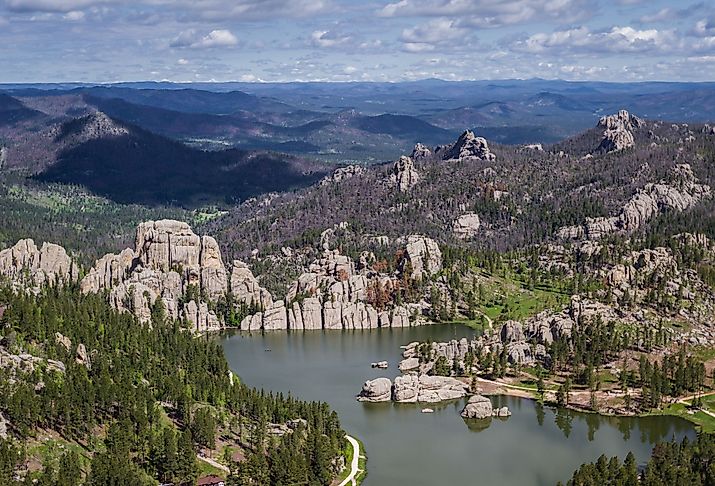 Aerial view of Sylvan Lake and granite formations in the Black Hills. Image credit Wollertz via Shutterstock.