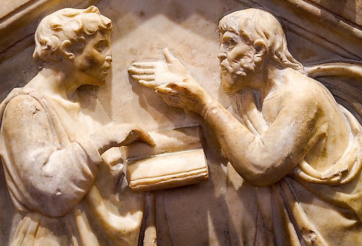 Low relief sculpture depicting Plato and Aristotle arguing by Andrea Pisano, adorning the external wall of Florence Cathedral. Image credit Krikkiat via Shutterstock