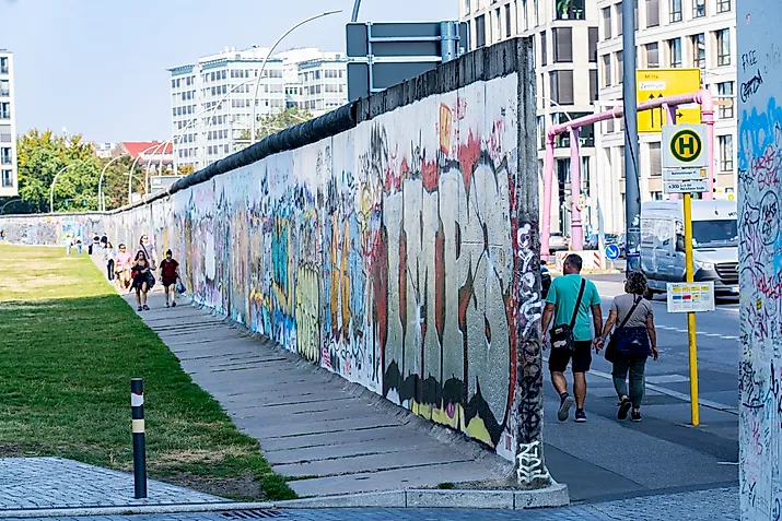 A remnant of the Berlin Wall in Berlin, Germany. Image credit: Aleksandr Dyskin / Shutterstock.com.