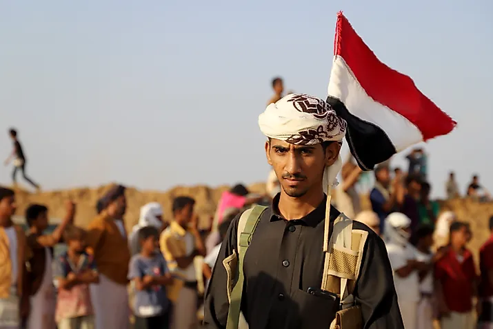 Local tribes mobilized to support government forces in northwest Yemen carry the nation's flag. Editorial credit: Mohammed al-wafi / Shutterstock.com