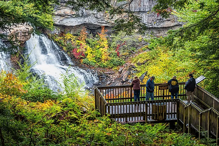 Visitors enjoying the sight of the Blackwater Falls at the Blackwater Falls State Park. Editorial credit: Kristi Blokhin / Shutterstock.com