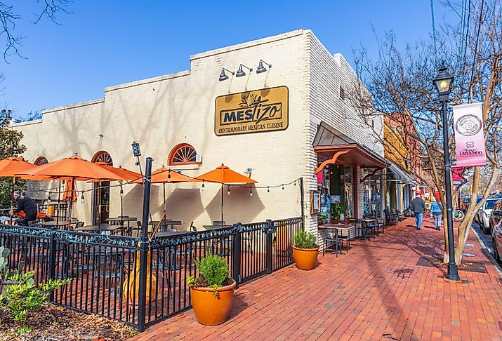 Restaurant and people walking on Main Street in downtown Davidson, North Carolina. Image credit Nolichuckyjake via Shutterstock