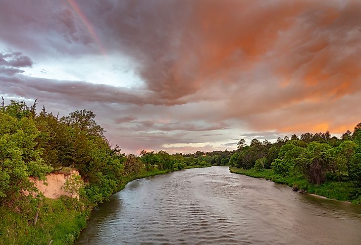 Colorful sunrise clouds over the Niobrara River near Valentine, Nebraska, USA.