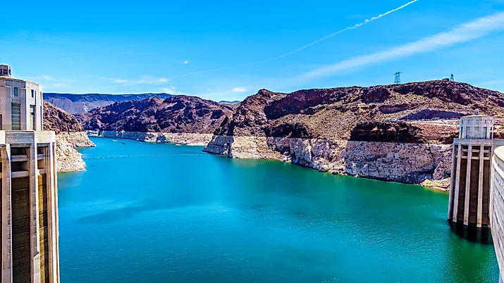 Low water level in Lake Mead and two Intake Towers that supply the water from Lake Mead to the Powerplant Turbines of the Hoover Dam hydroelectric power station 