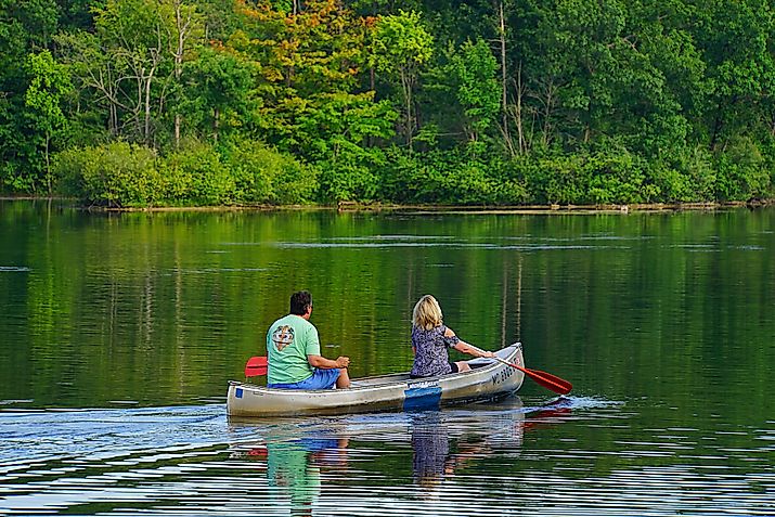 A couple canoeing in Metamora, Michigan, just an hour from Detroit. Editorial Credit: Fsendek, Shutterstock.com
