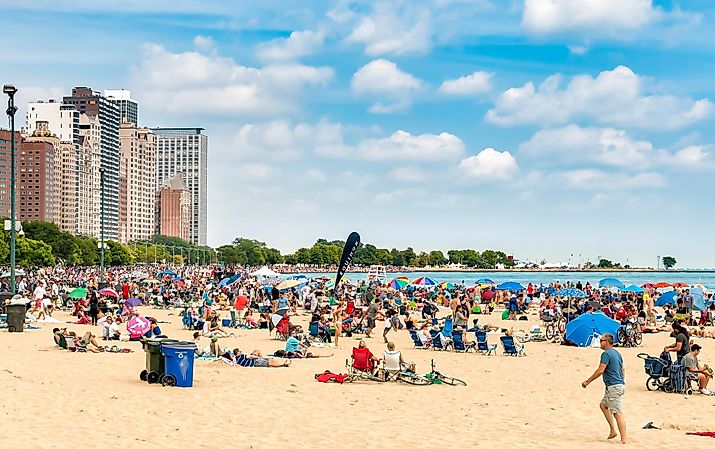 People enjoying summer time at the popular North Avenue Beach on the lake Michigan in Chicago