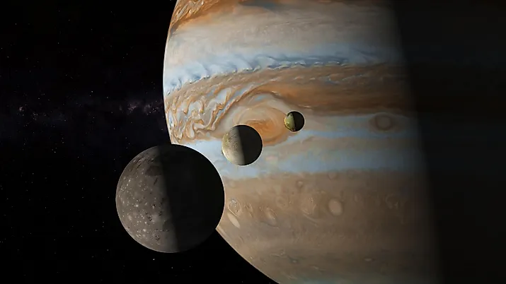 Three moons of Jovian System. Jupiter's moons. Io, Europa and Ganymede.