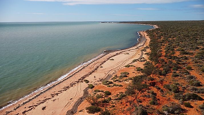 Monkey Mia, where the desert meets the sea and untouched vibrant red sand and blue ocean in Francois Peron National Park, Western Australia