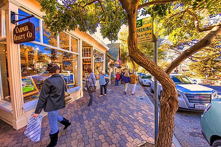 People shopping on the main street in Carmel, California via oliver de la haye / iStock.com