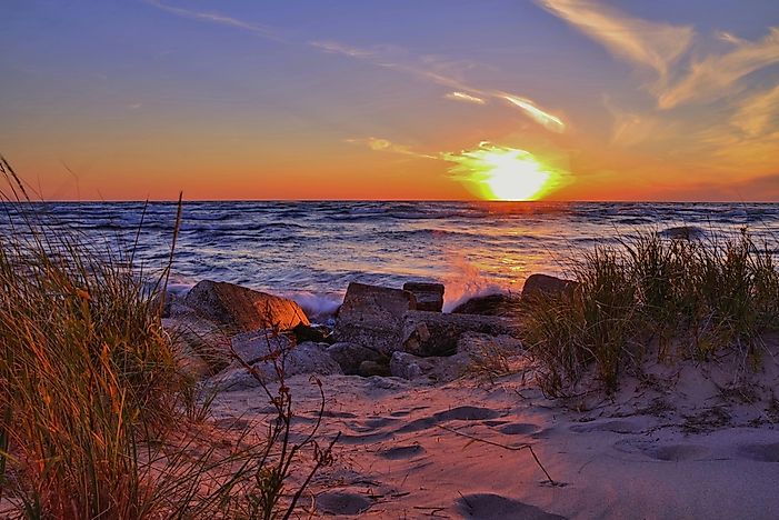 A beautiful sunset over the beach at Ludington State Park, Michigan. A beautiful sunset over the beach at Ludington State Park, Michigan.