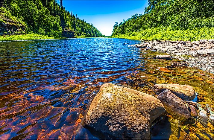 Why Does the Width of a River Increase As it Flows Downstream?