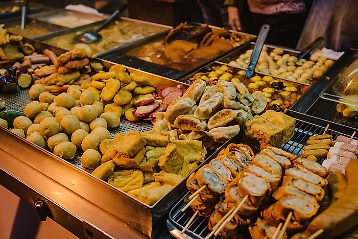 Street food offerings in a Hong Kong night market. Street food offerings in a Hong Kong night market.