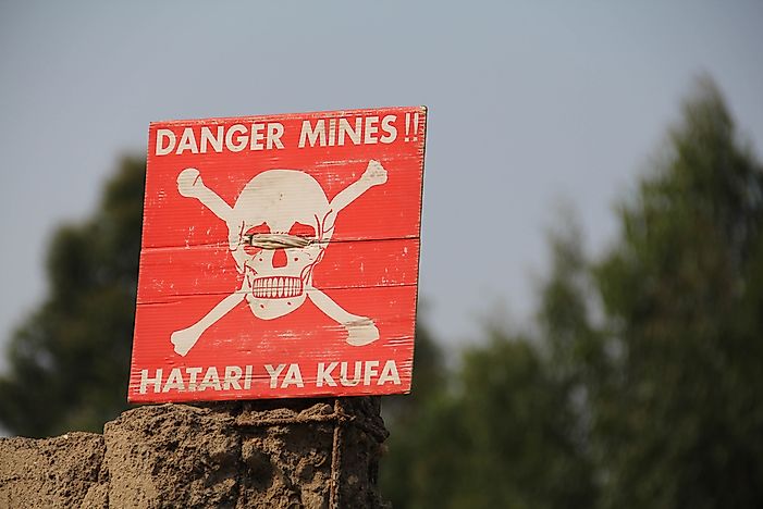 A sign warns of landmines in the Democratic Republic of the Congo. 