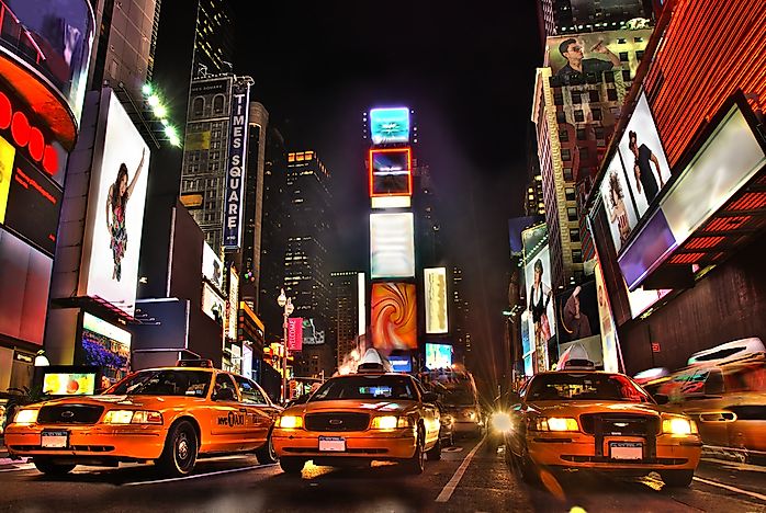 Times Square - a giant wall of advertisements. Times Square - a giant wall of advertisements.