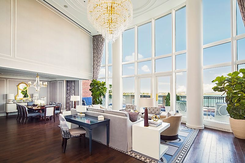 This suite features beautiful floor to ceiling windows. Editorial credit: bostonharborhotel.com