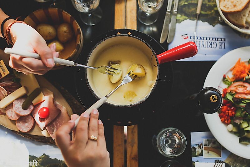 Switzerland is famous for cheese and fresh produce. Photo by angela pham on Unsplash