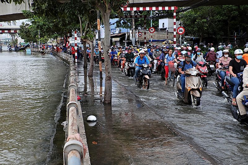 Editorial credit: xuanhuongho / Shutterstock.com. Flooded streets in Ho Chi Minh City, Vietnam. Editorial credit: xuanhuongho / Shutterstock.com. Flooded streets in Ho Chi Minh City, Vietnam.