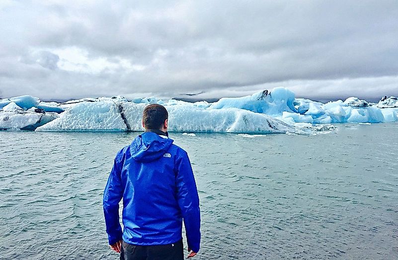 Man standing in front of Jökulsárlón Glacier Lagoon in the Vatnajökull National Park. Image credit: Scoundrelgeo/Wikimedia.org Man standing in front of Jökulsárlón Glacier Lagoon in the Vatnajökull National Park. Image credit: Scoundrelgeo/Wikimedia.org